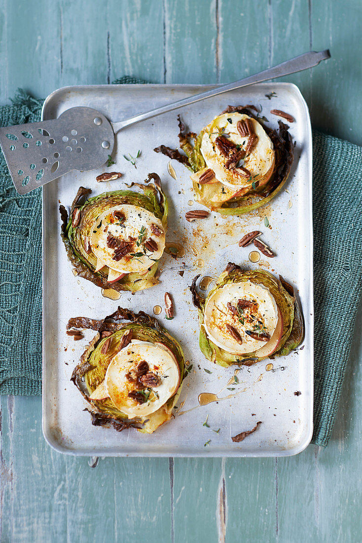 Cabbage steaks with apple, goats cheese and pecans