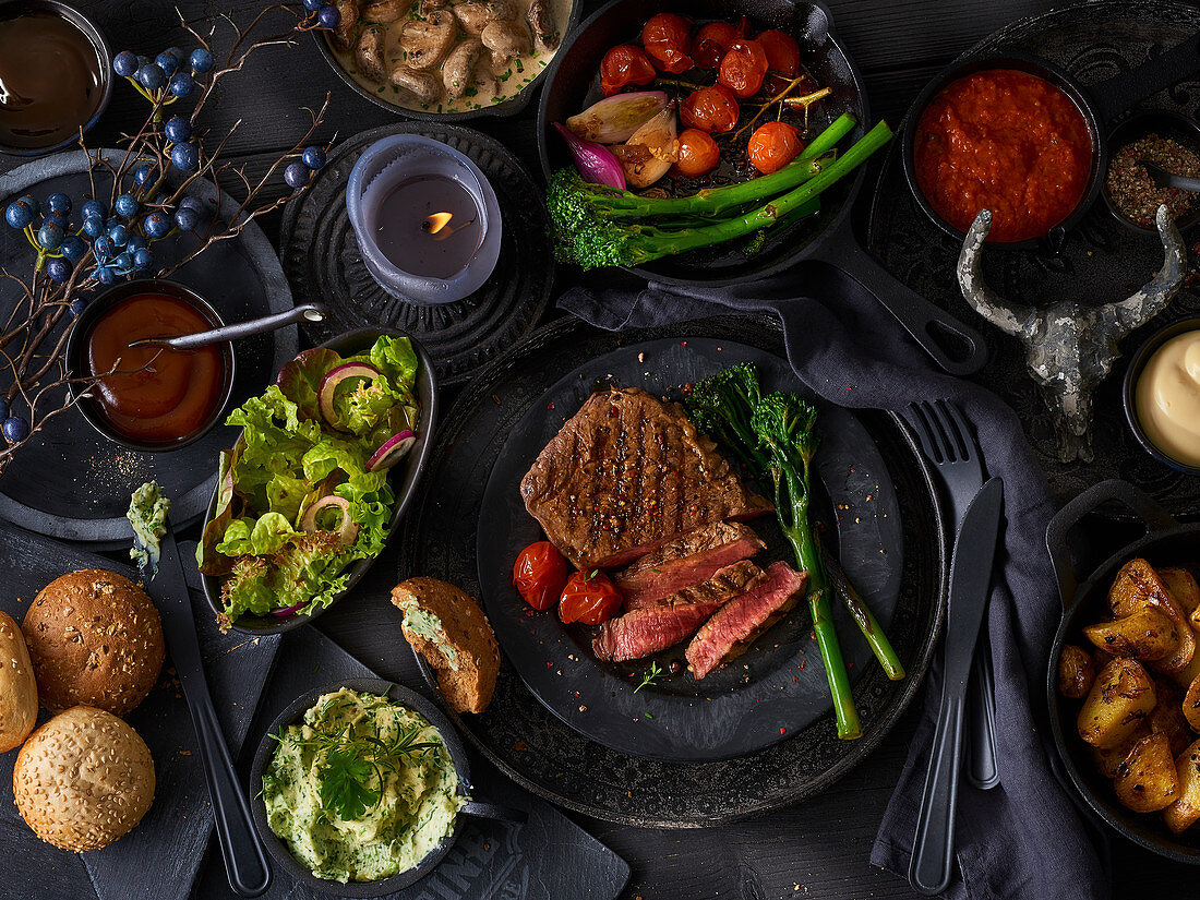 Grilled fillet steak with vegetables and salad