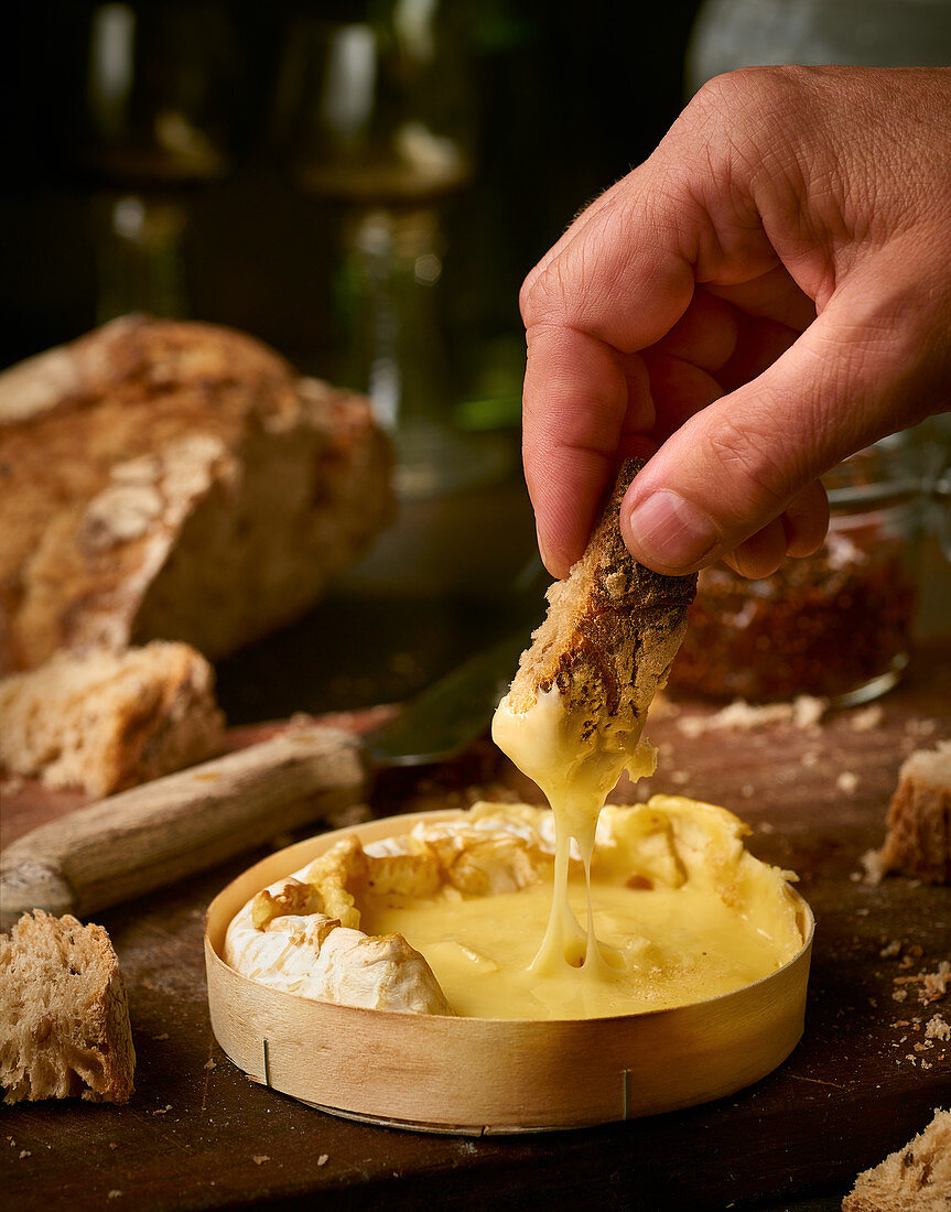 Baked camembert with bread for dipping