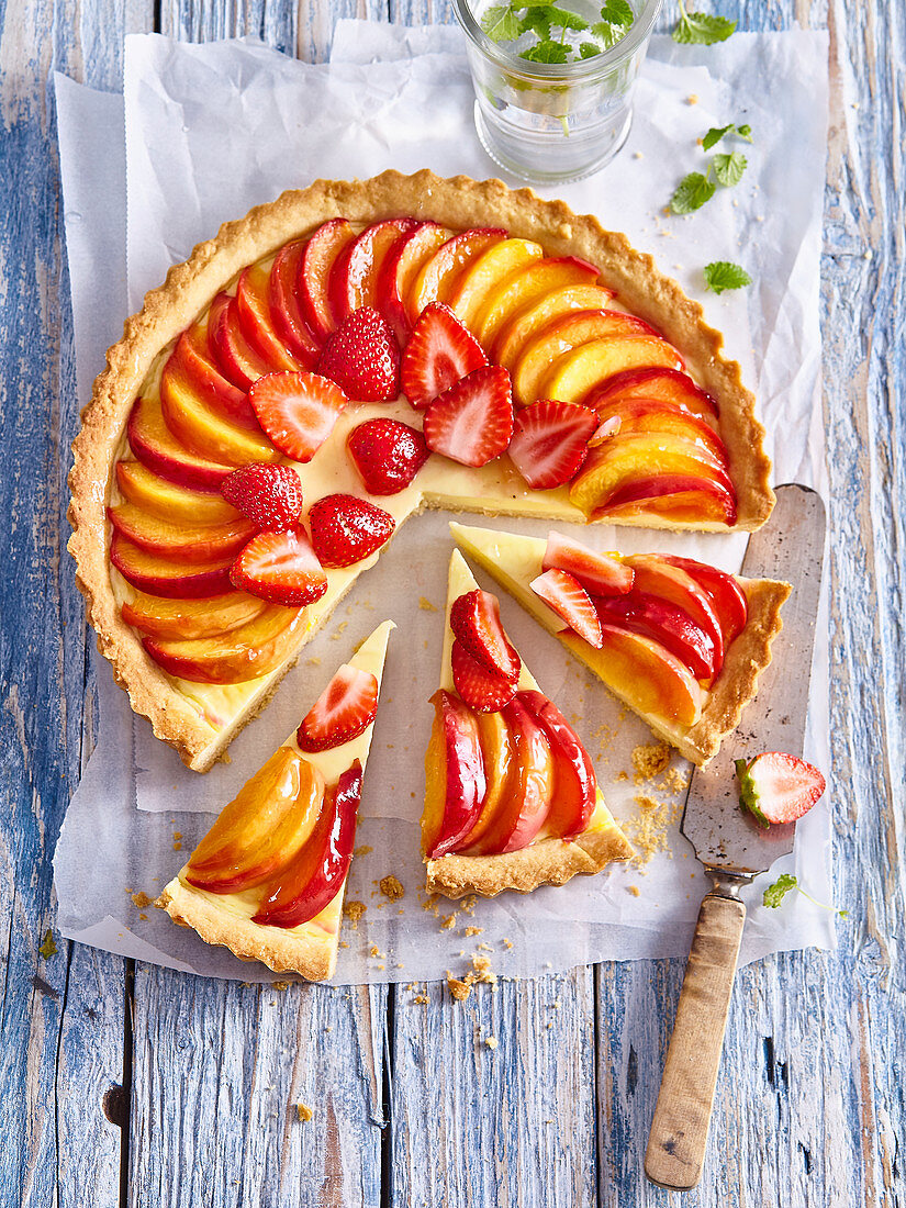 Peach cake with strawberries