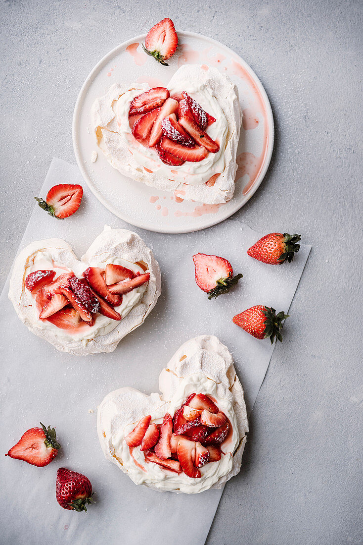 Heart shaped pavlova with strawberries