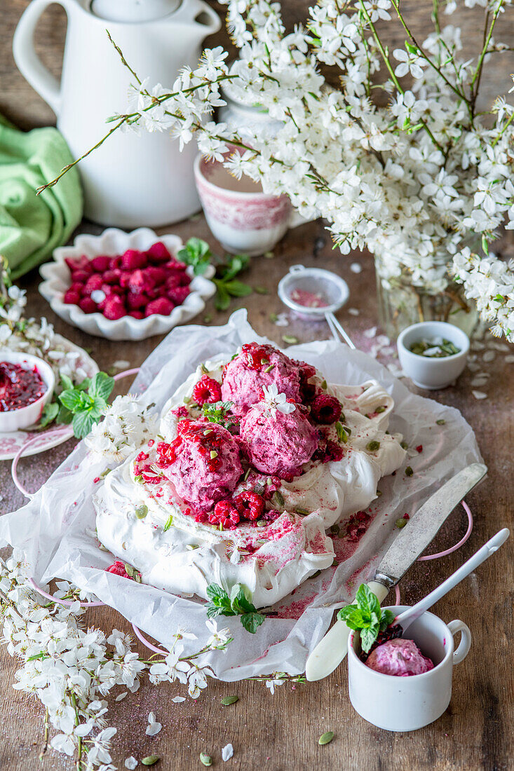 Pavlova with raspberry ice cream