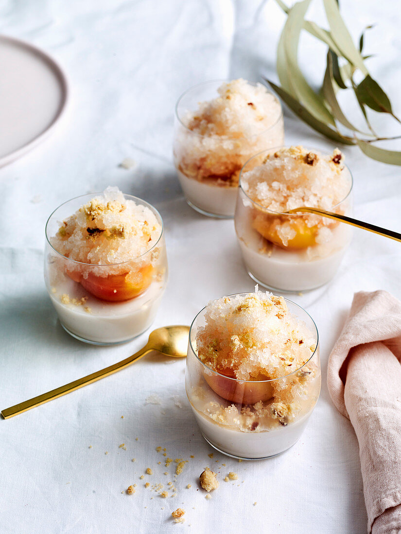 Almond milk jelly with prosecco-poached peach and almond crumb