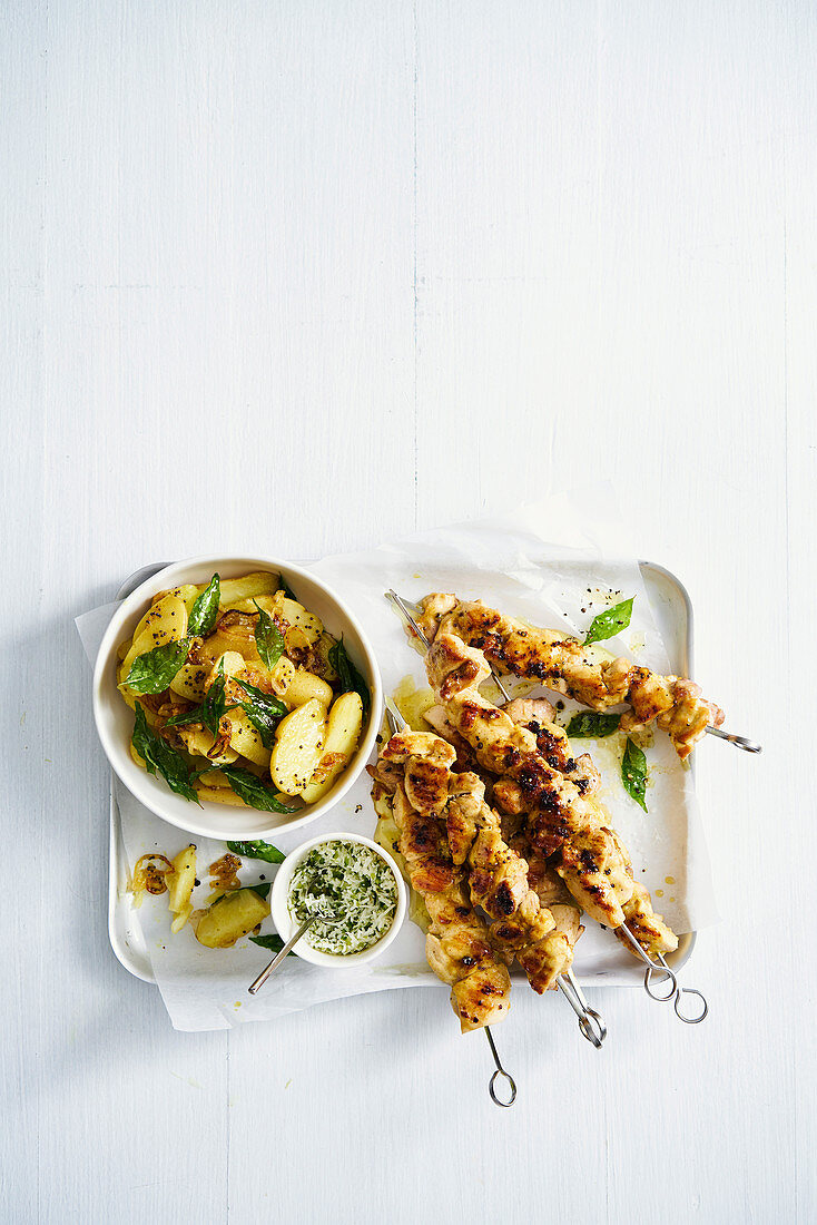 Turmeric chicken skewers with chilli and coconut sambal