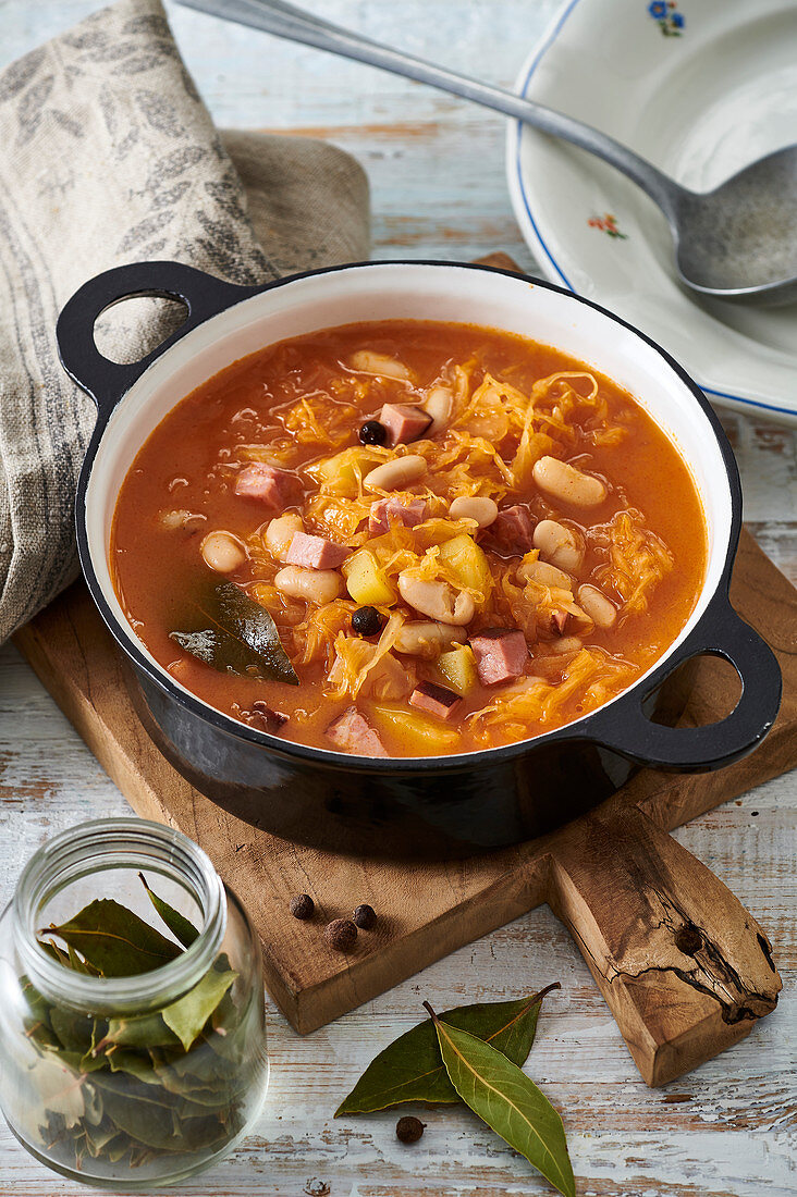 Cabbage soup with white beans and smoked meat