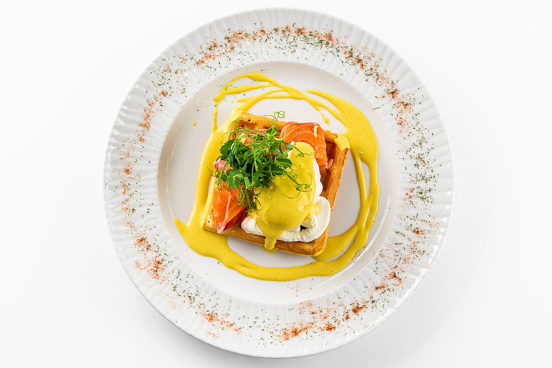 Toast with poached egg, salmon and mustard sauce
