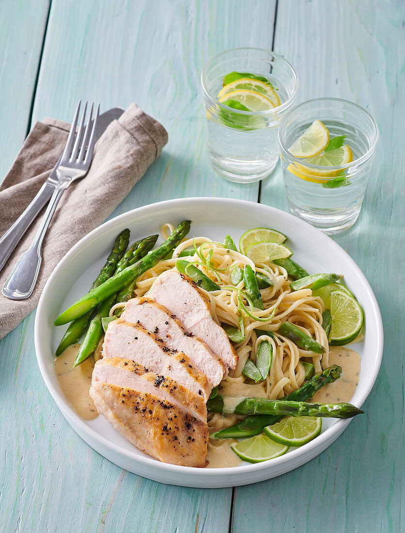Chicken breast with pasta and asparagus