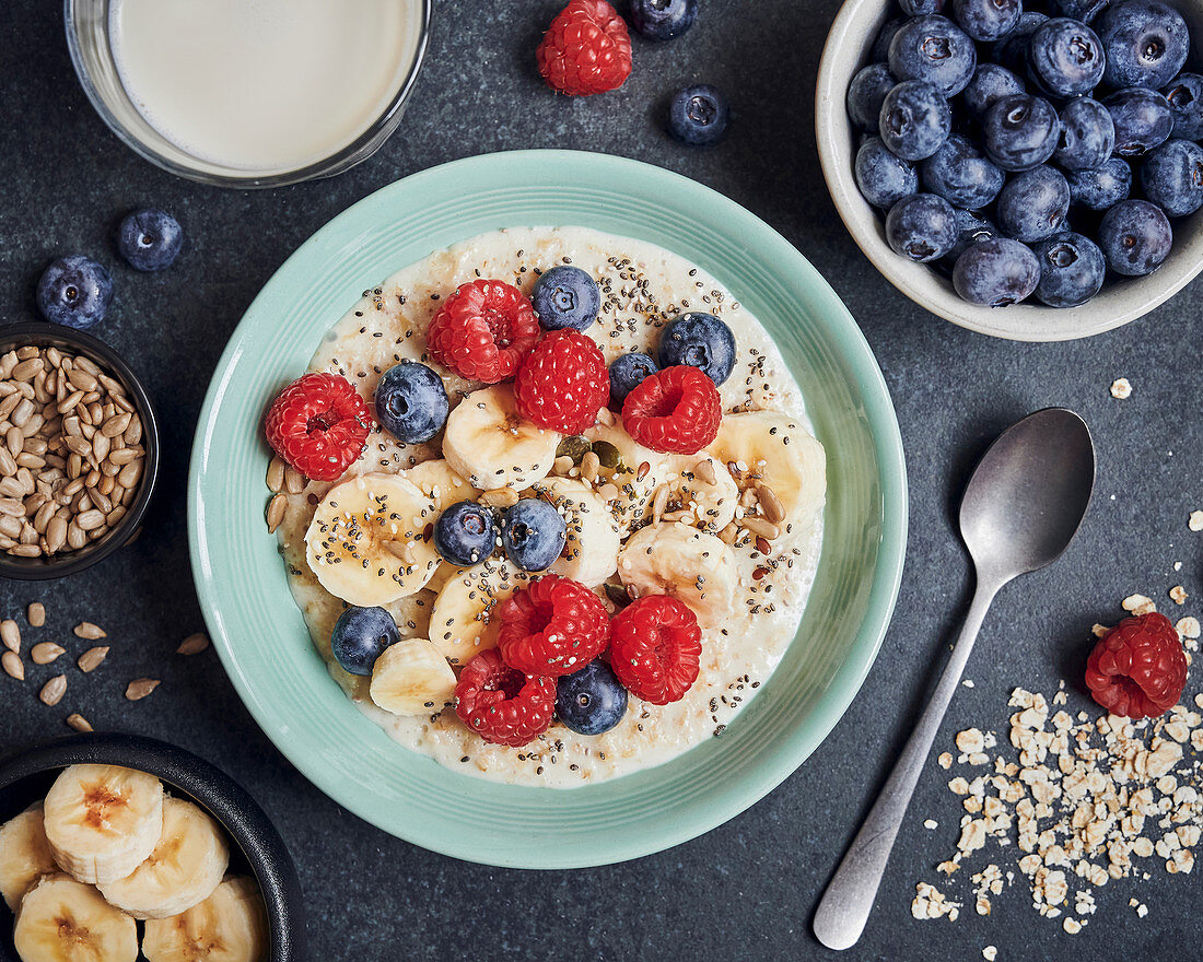 Oatmeal breakfast bowl with berries and bananas