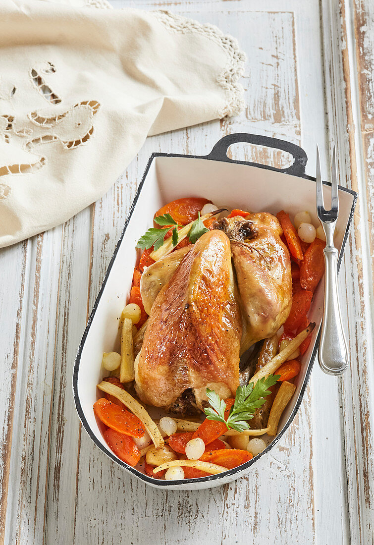 Baked guinea fowl with vegetables