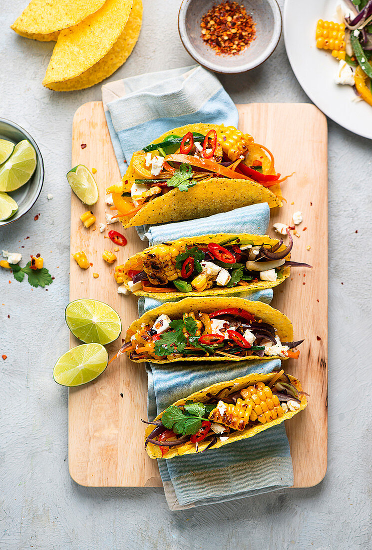Colourful tacos with vegetables and feta cheese