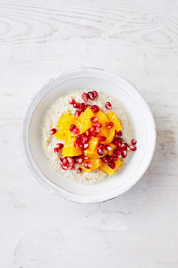 Coconut, quinoa and chia porridge with orange and pomegranate