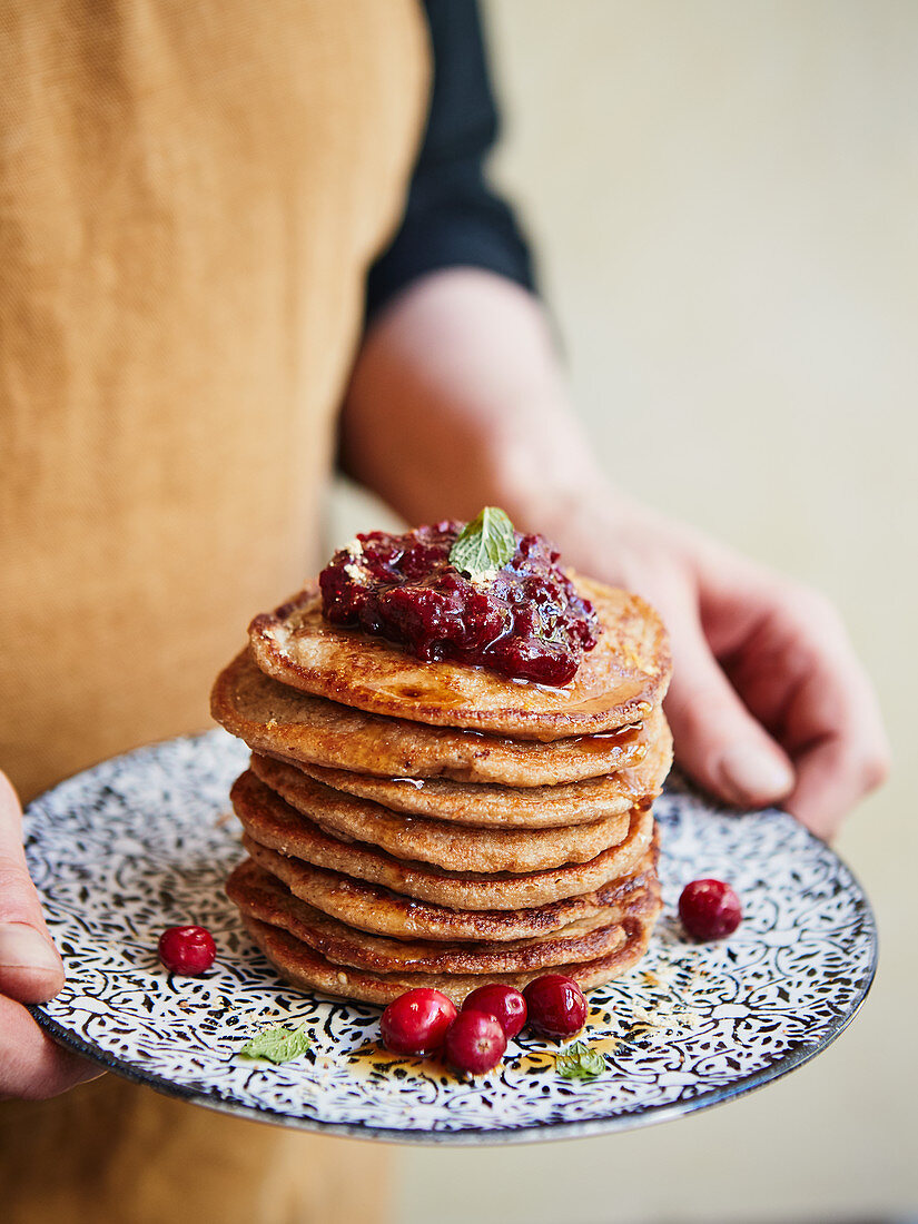 Oat and apple pancakes with cranberry sauce