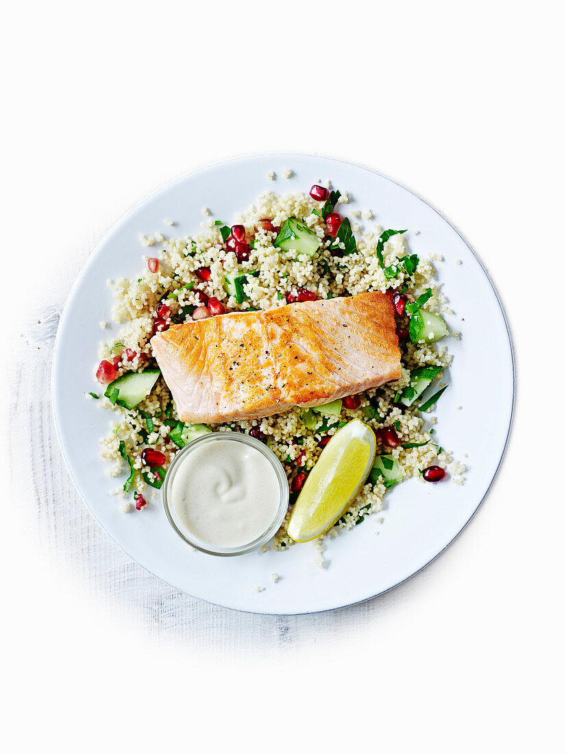 Salmon with couscous and tahini sauce