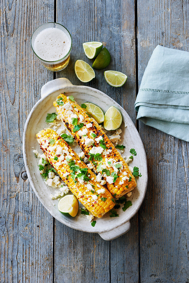 Grilled corn on the cob with mayonnaise, chili, coriander and feta
