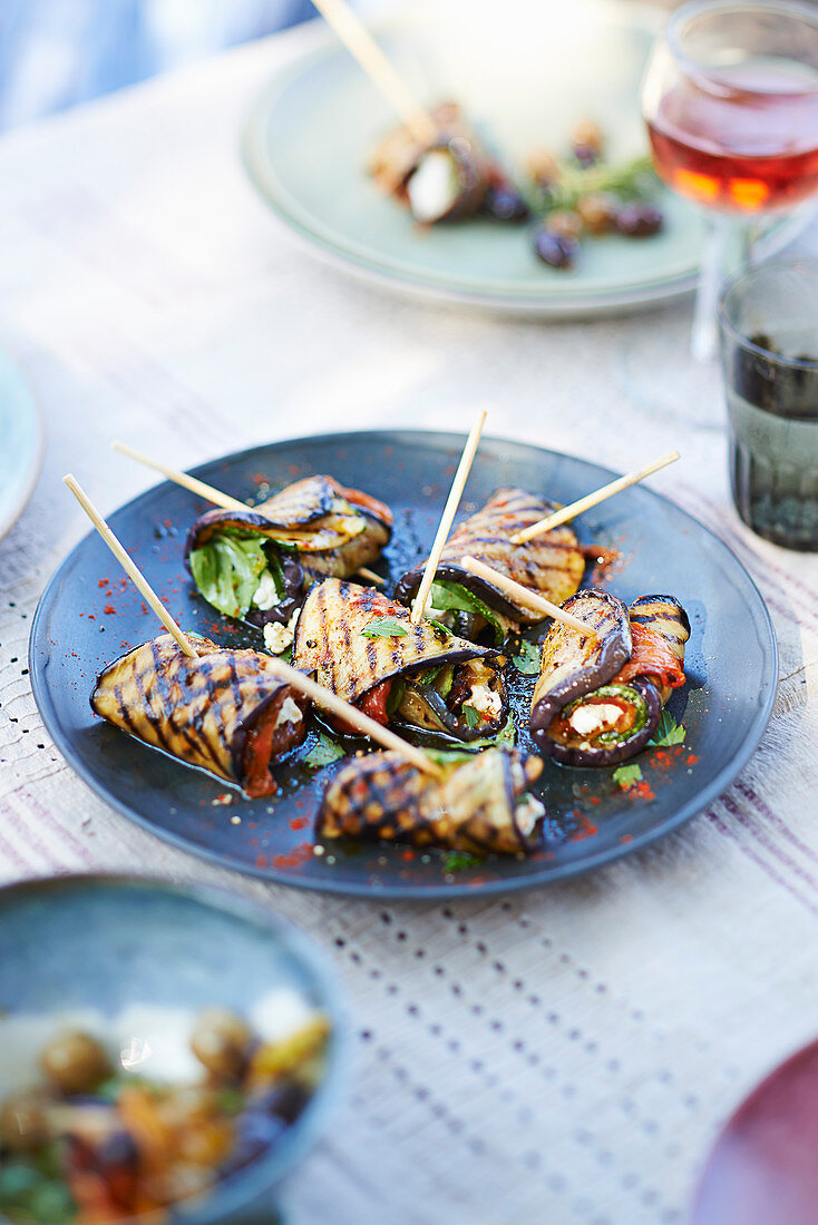 Fish skewers with aubergine, peppers and sun-dried tomato