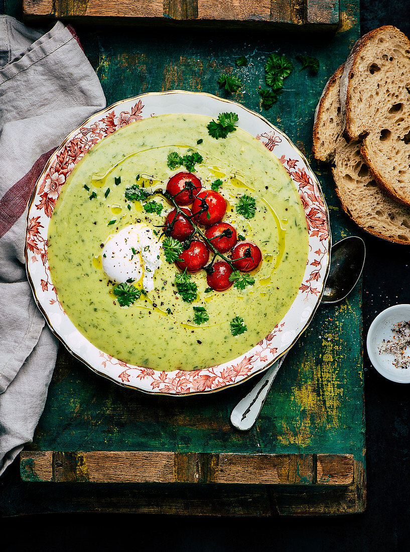 Wild garlic soup with egg and cherry tomatoes