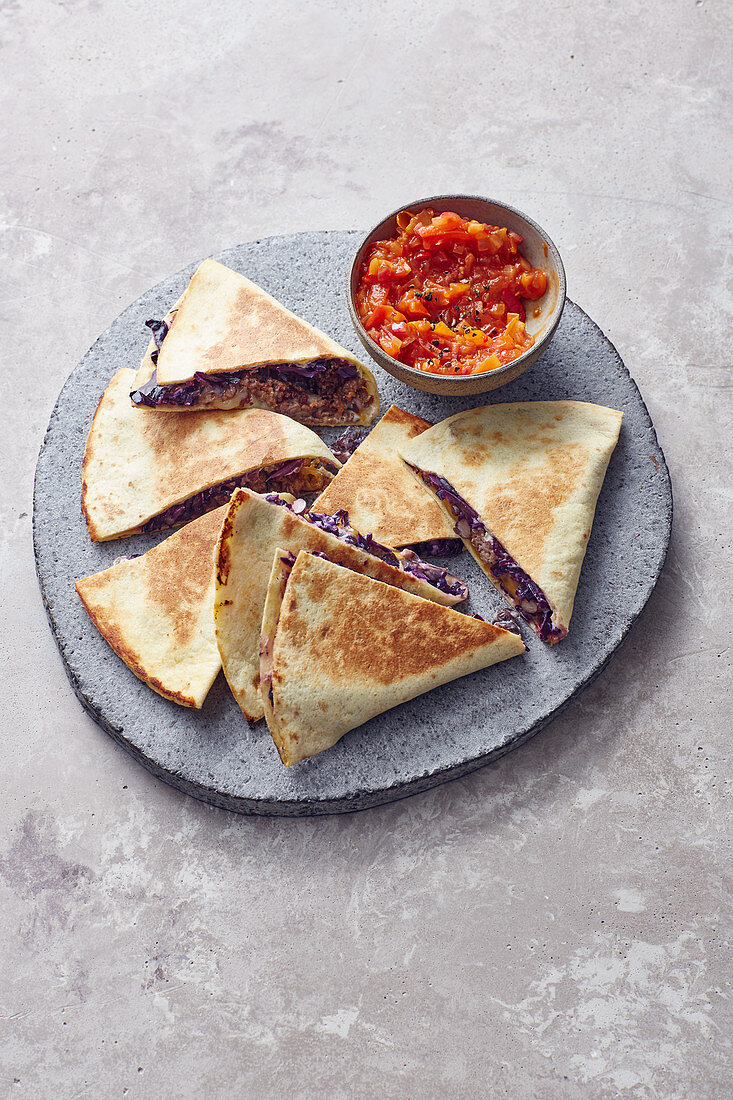 Red cabbage quesadillas with minced meat and tomato salsa