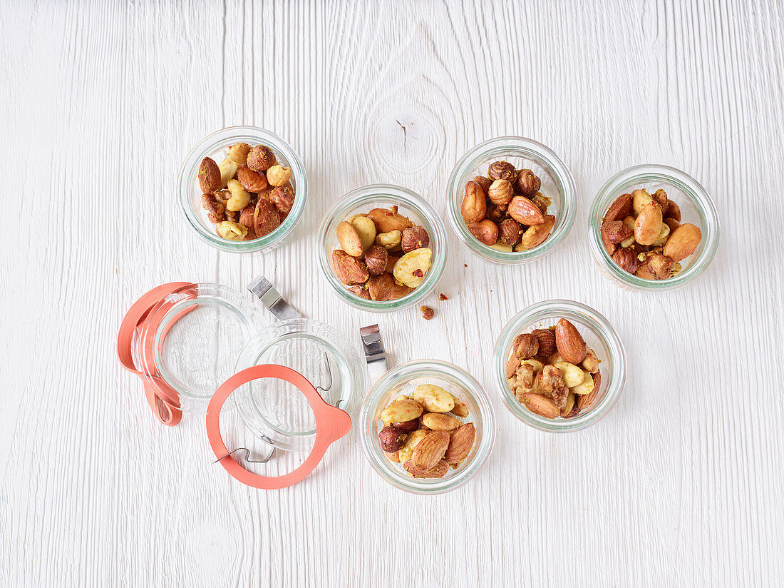 Roasted oriental nuts in flip-top jars