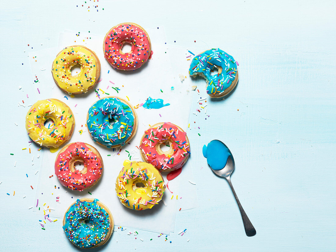 Colourful Sprinkled Donuts With Icing
