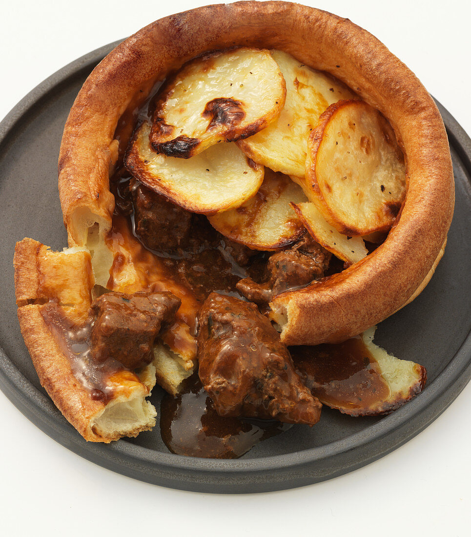 Yorkshire pudding filled with beef and potatoes