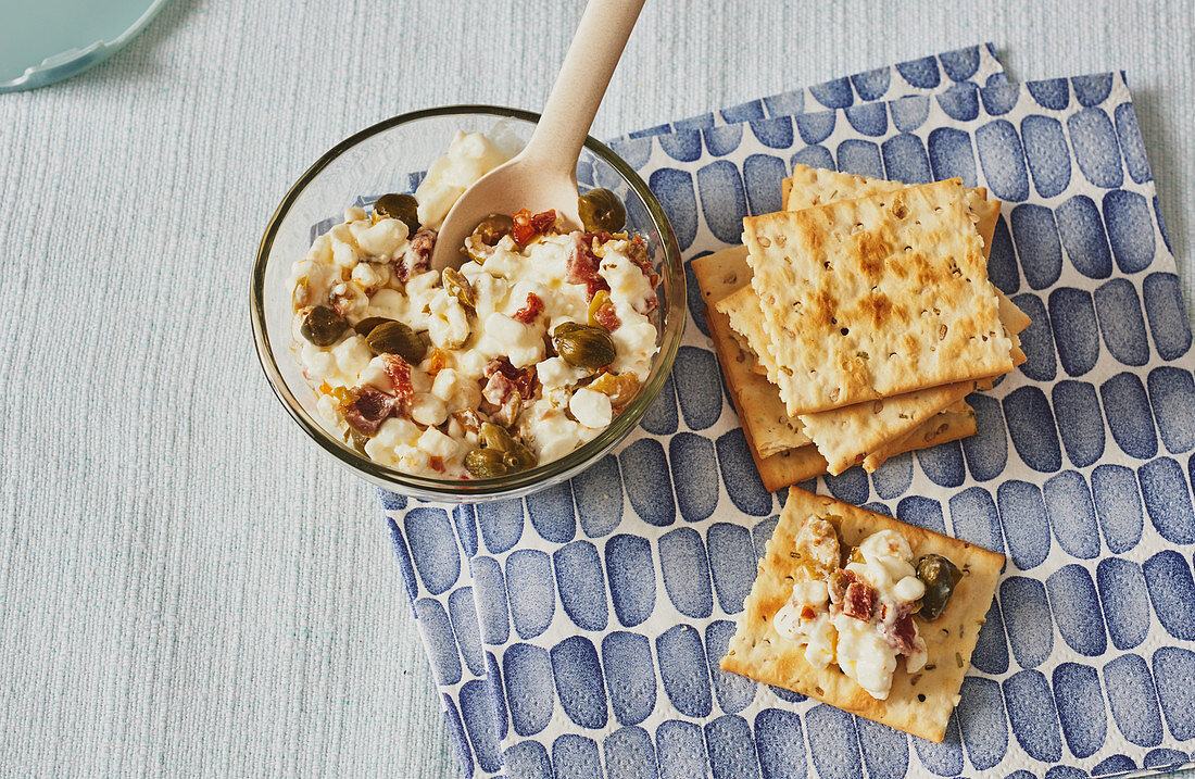 Cream cheese dip with olives, capers and dried tomatoes