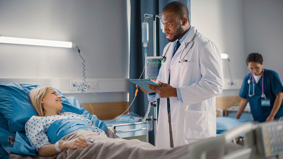 Doctor using digital tablet