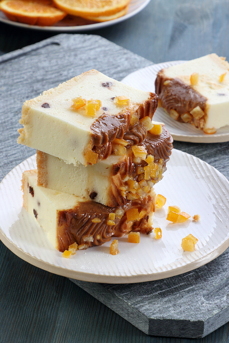 Cheesecake with caramel glaze and orange zest
