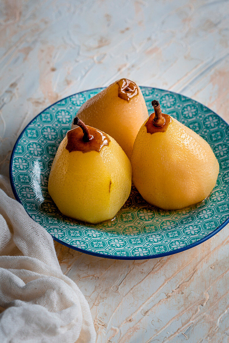 Three poached pears