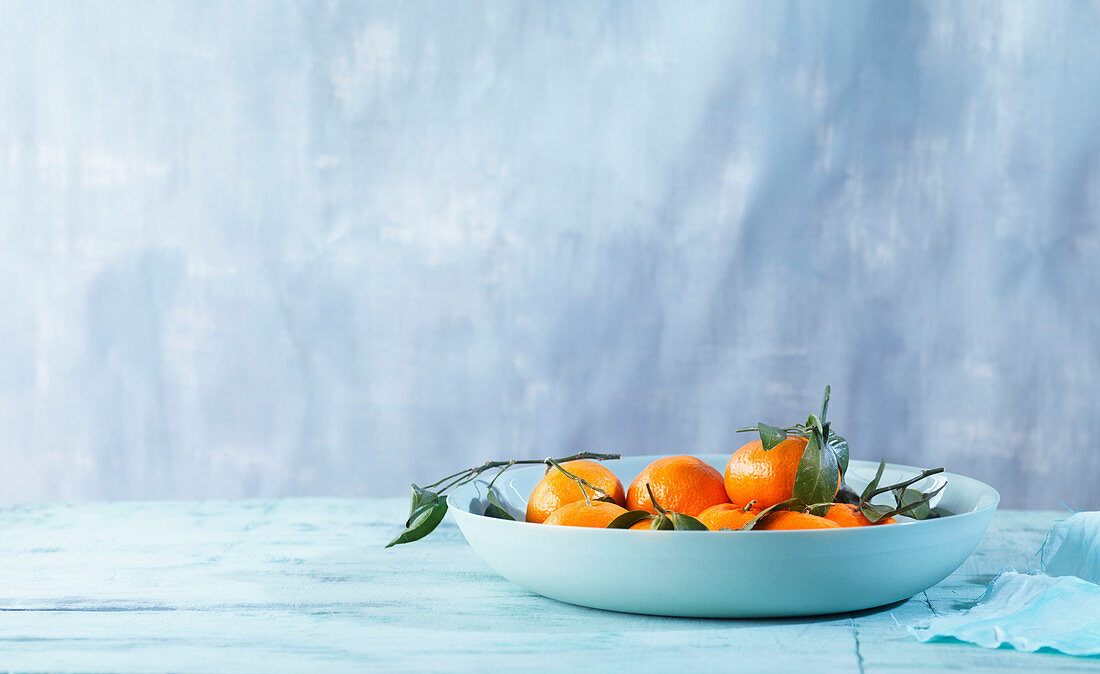 Still life of clementines in a bowl