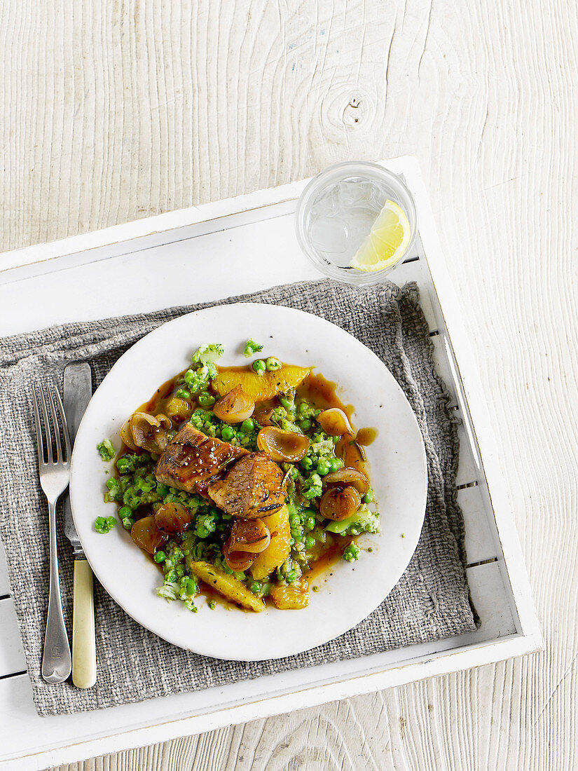 Orange and rosemary pork with broccoli and pea crush