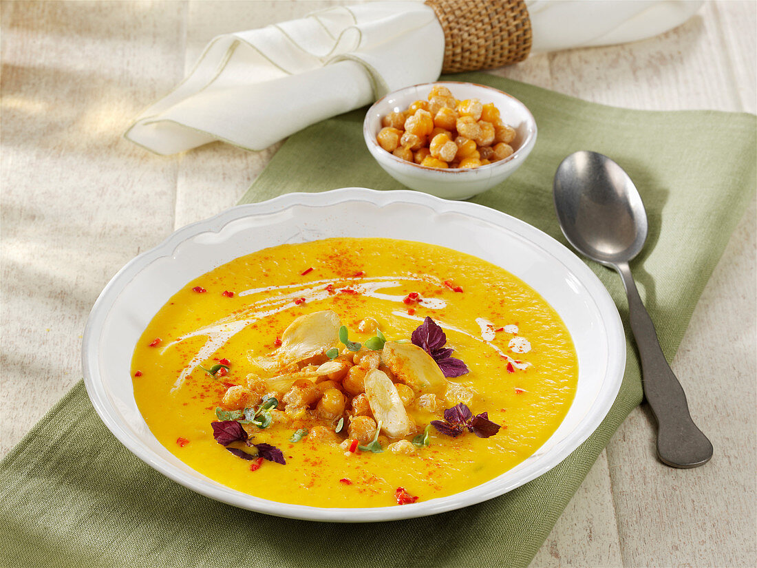 Carrot and parsnip soup with coconut milk and chickpeas