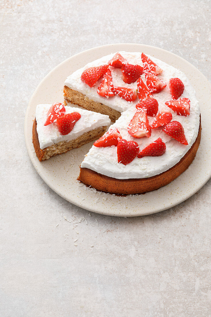 Coconut and lime tart with strawberries
