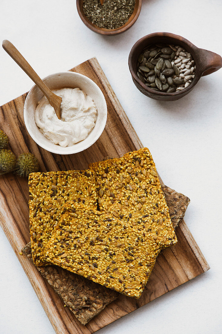 Crispbread with seeds and yoghurt hummus