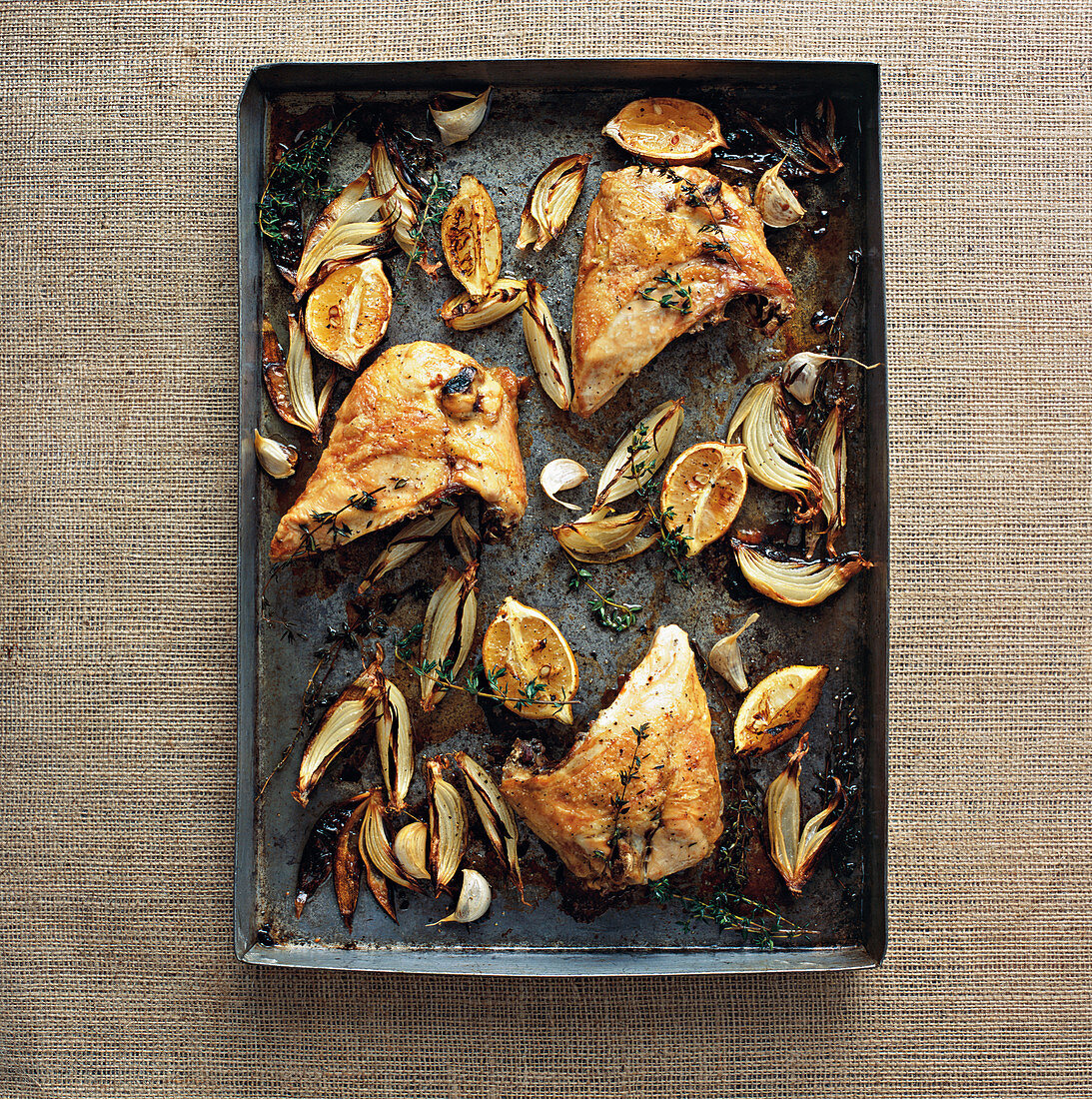 Lemon Chicken, Onions and Thyme on baking tray