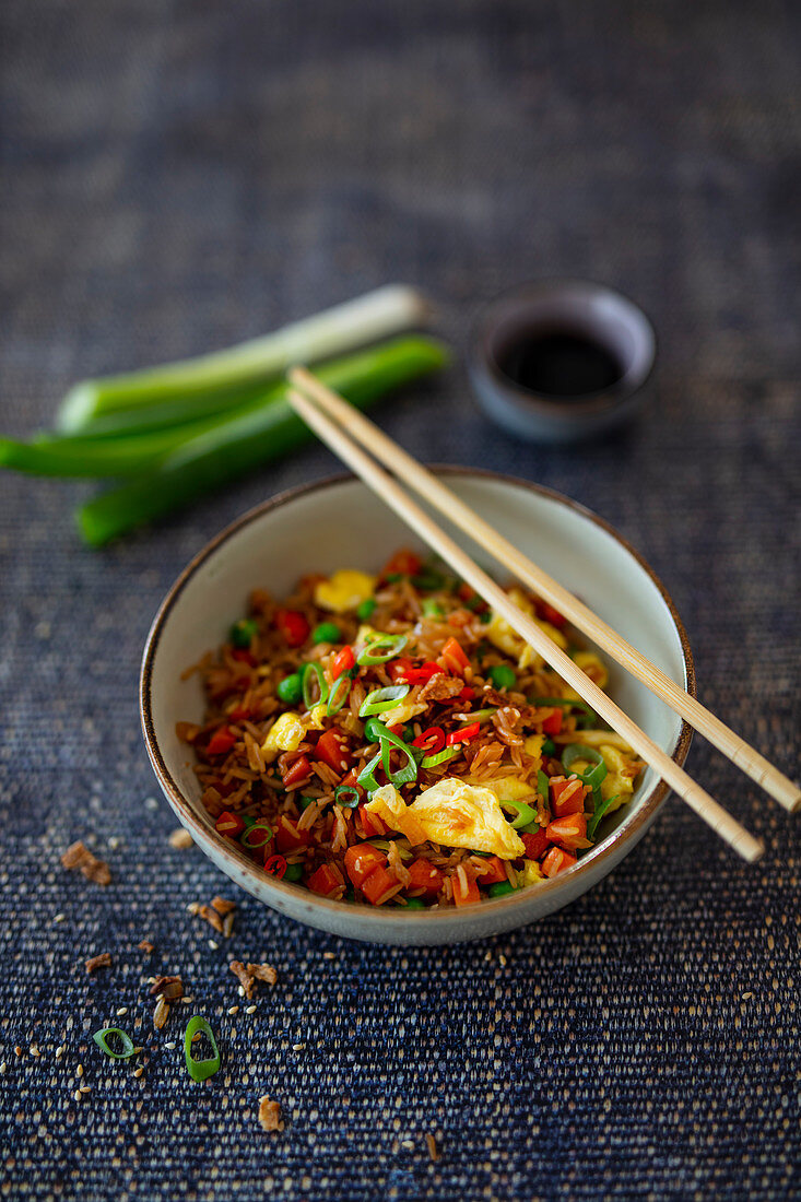 Nasi Goreng with carrots, peas and scrambled eggs