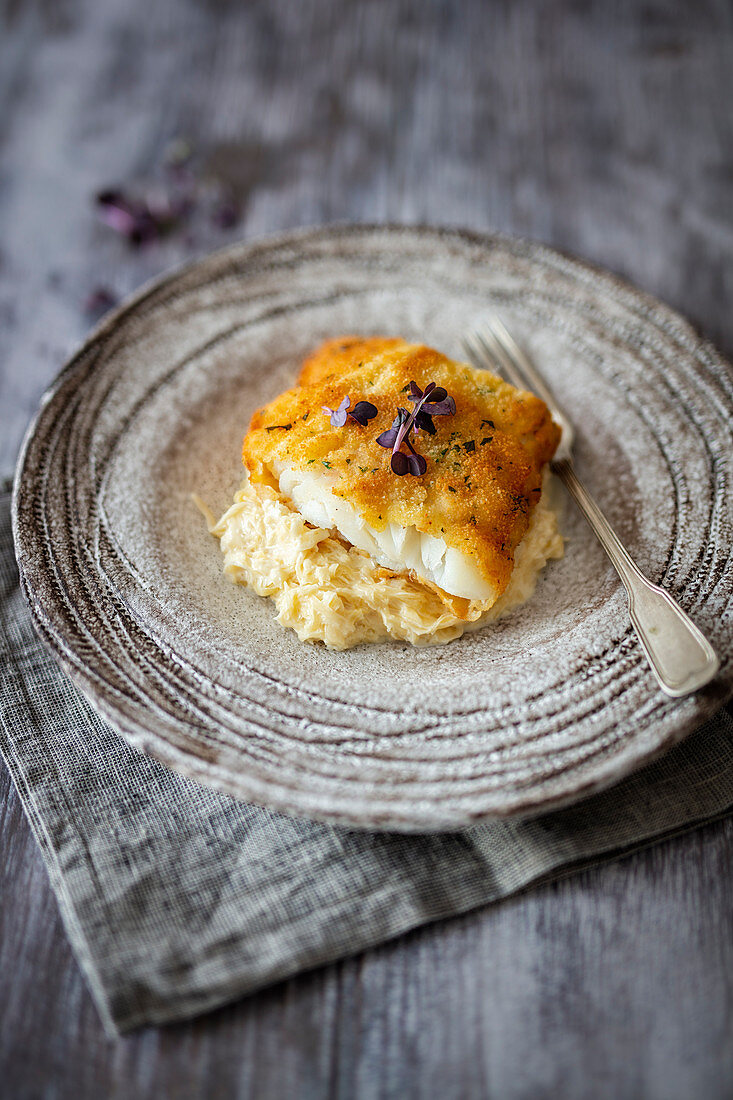 Breaded skrei with cream sauerkraut