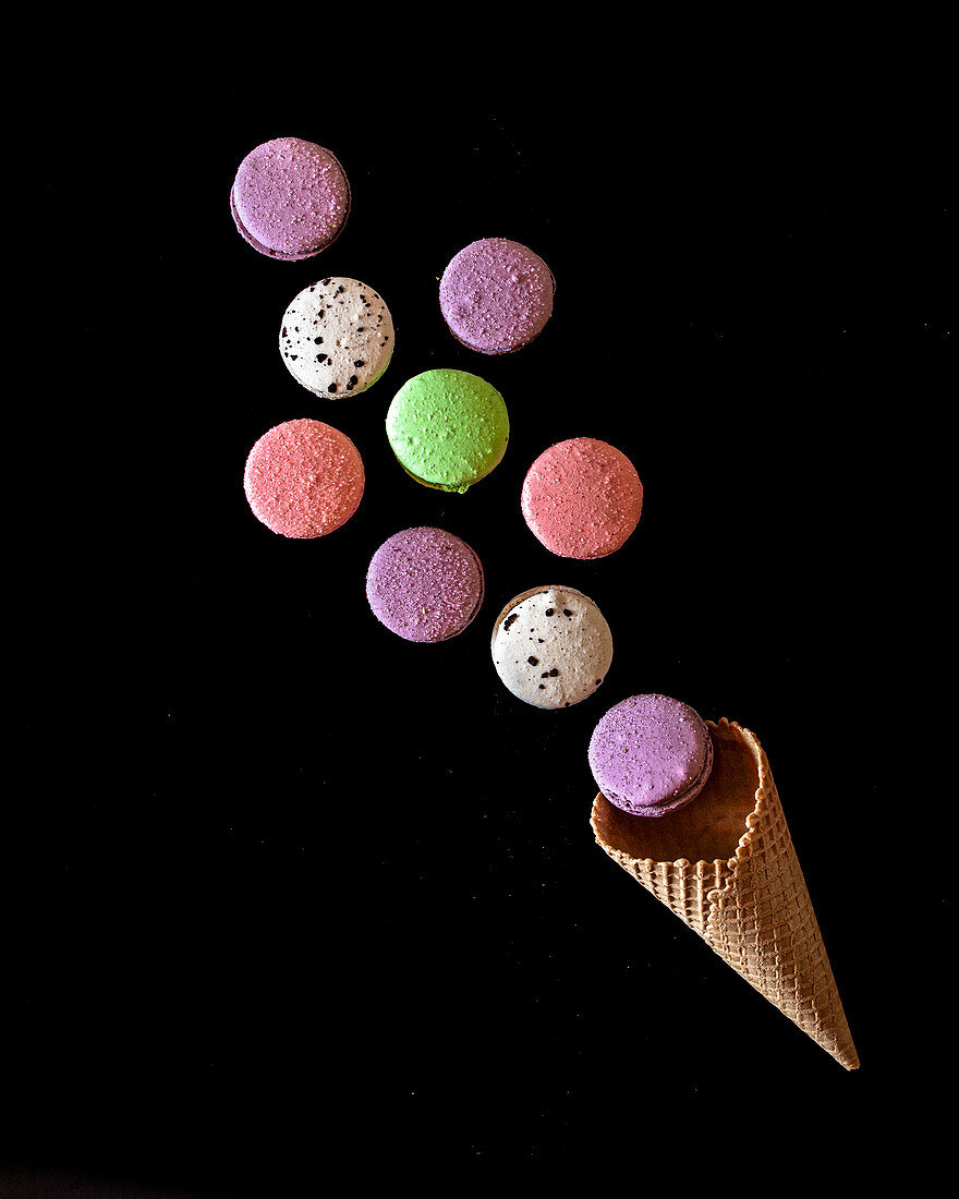 Colourful macarons and waffle cone