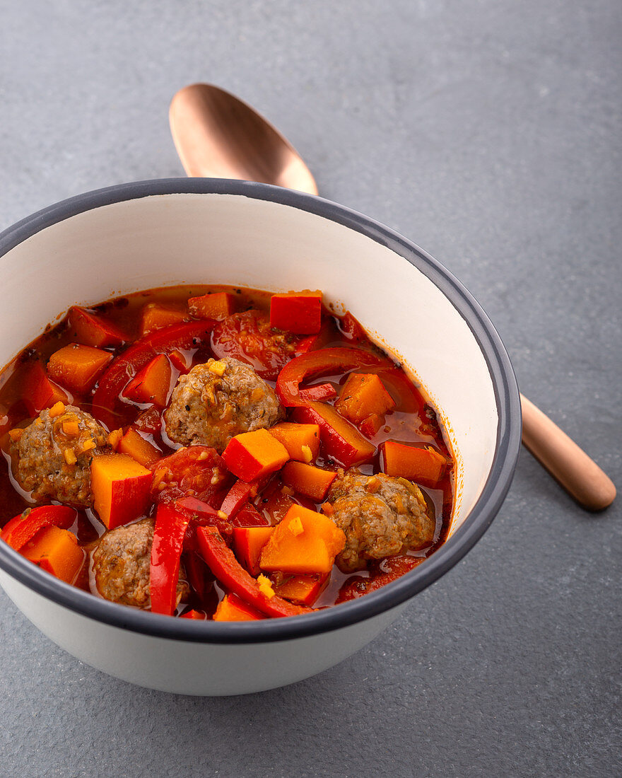 Pumpkin stew with meatballs and peppers