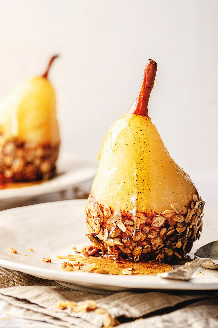 Poached pear with chocolate and granola