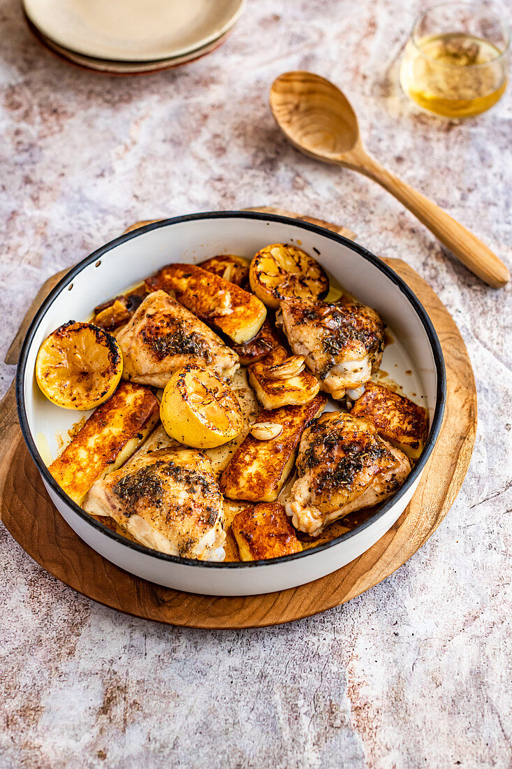 Halloumi cheese and chicken traybake with maple syrup, lemon and garlic