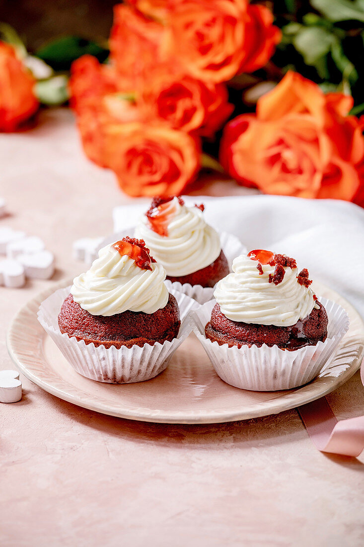 Red velvet cupcakes with whipped cream