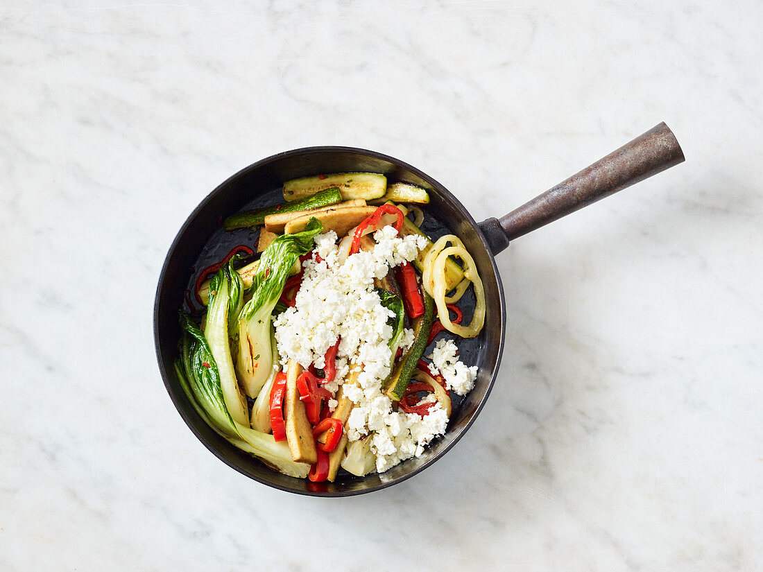 Sautéed tofu and vegetables with feta cheese
