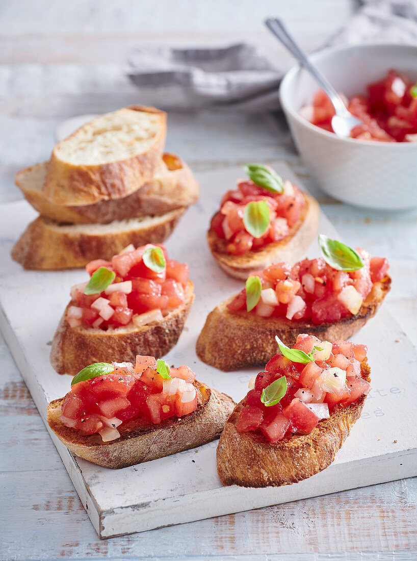 Roasted toasts with tomatoes