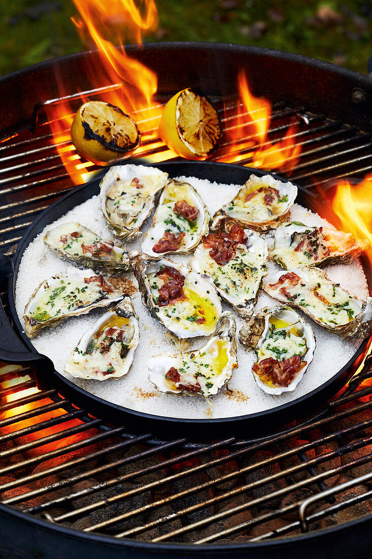 Spicy and smokey grilled oysters