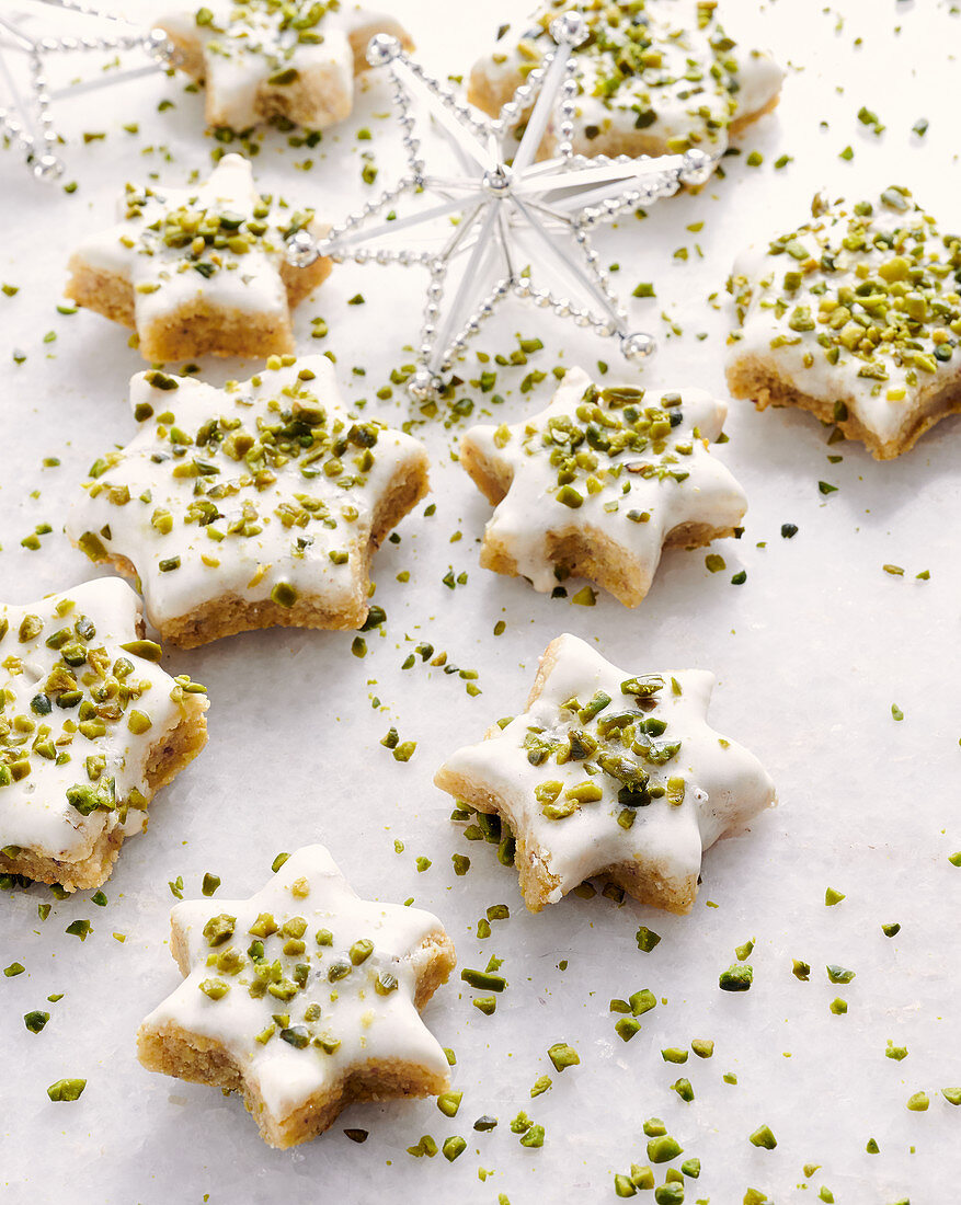 Star cookies with icing and pistachios