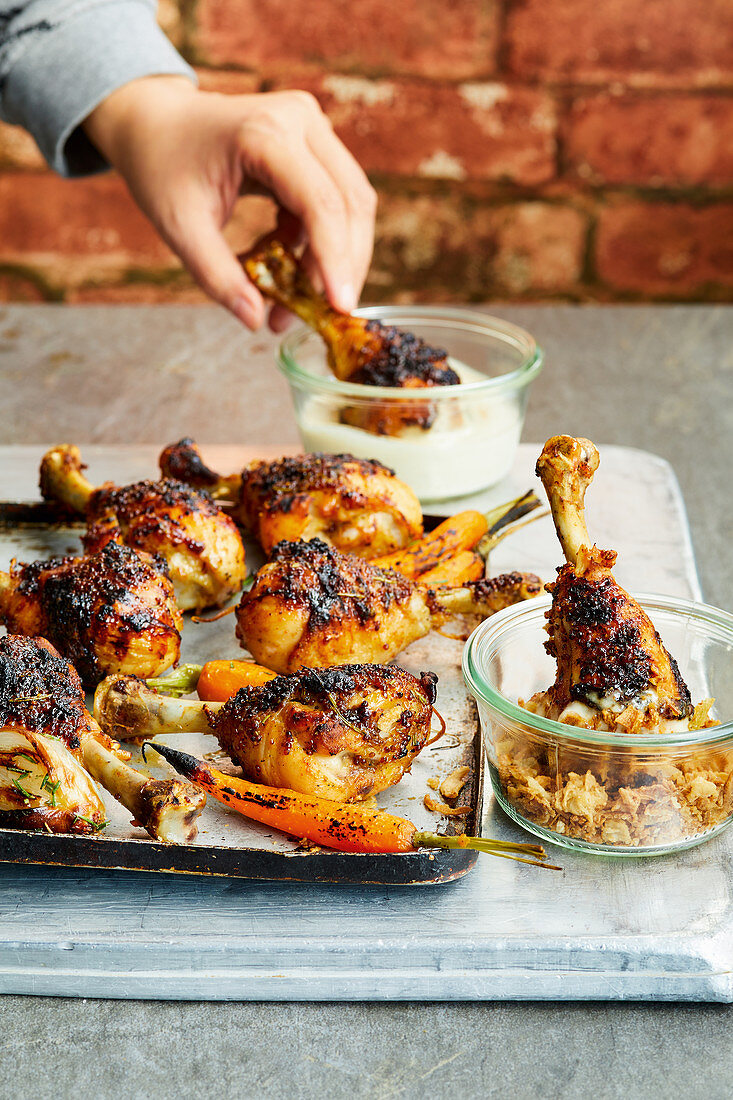Grilled chicken drumsticks with lemon and maple syrup