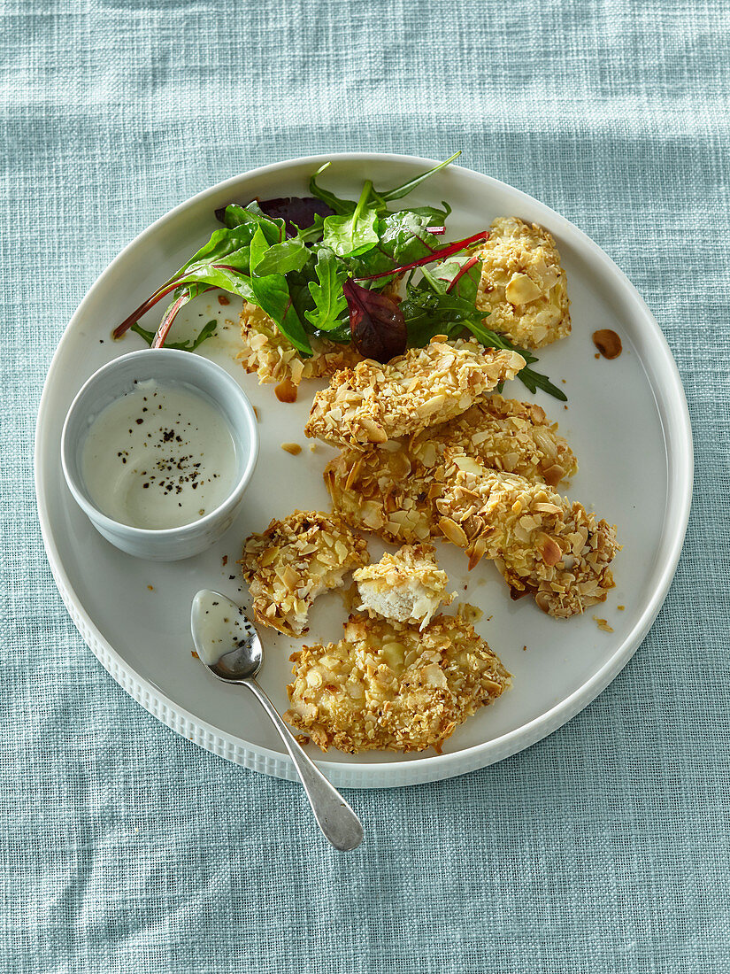 Almond chicken strips with yoghurt dip