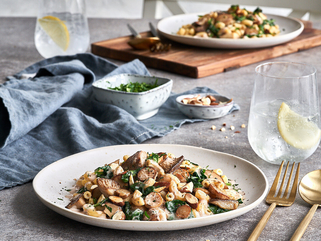 Vegan pasta with almond sauce and king oyster mushrooms