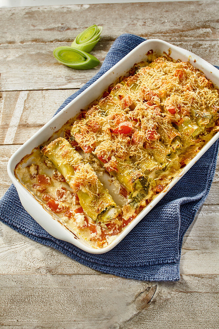 Leek cannelloni with tomatoes and three kinds of cheese