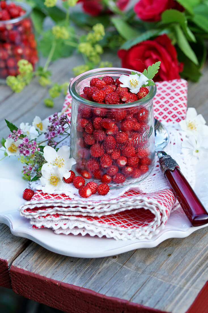 Wild strawberries in a glass